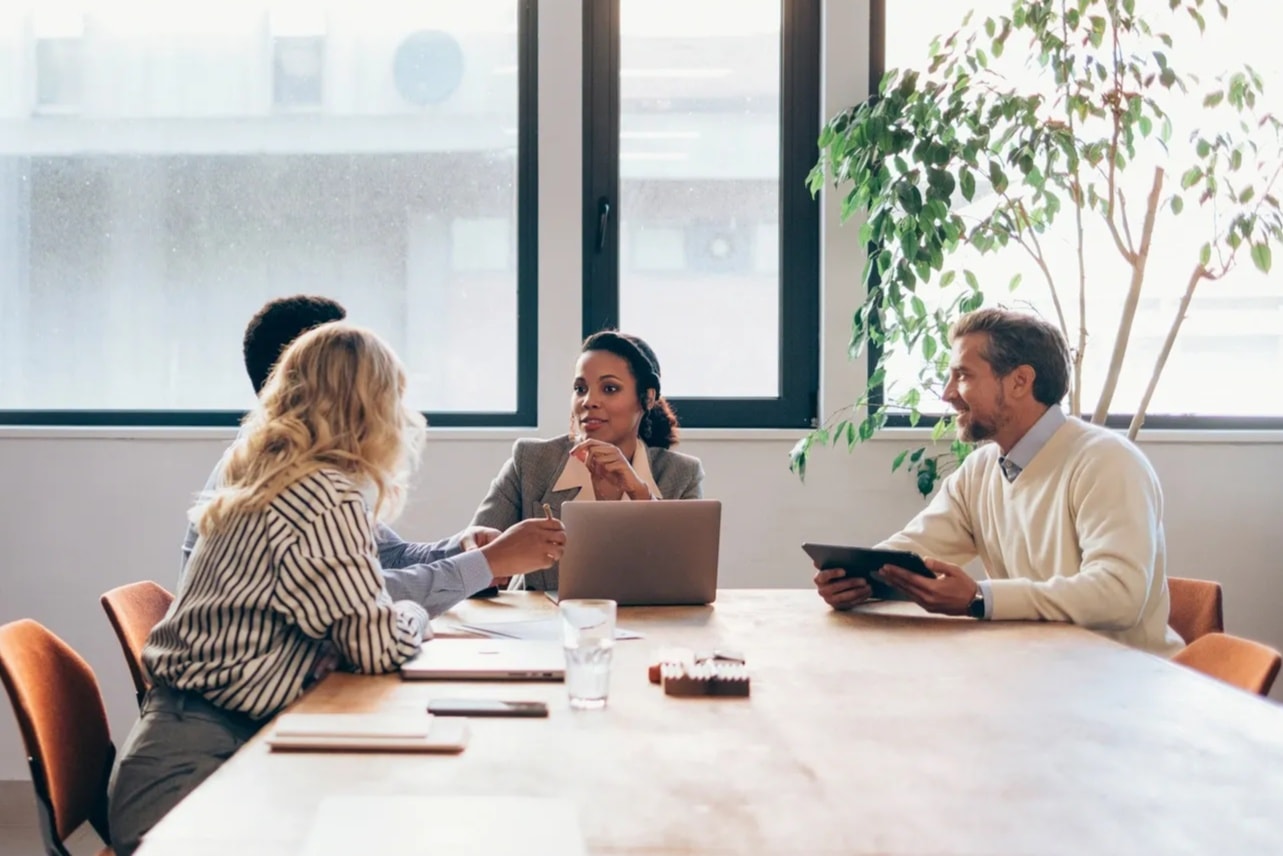 Lurning team collaborating in a modern office